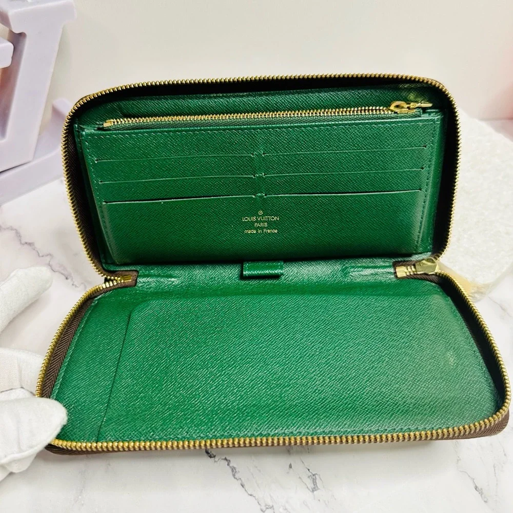 EUC Louis Vuitton Monogram Groom Zippy Organizer Wallet Alpine Green